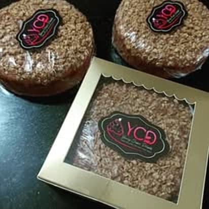 Hazelnut praline tea cakes in the bakery's gold window box